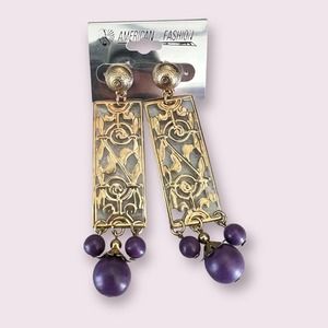 Vintage 80s gold tone purple long panel cut metal dangle earrings beaded